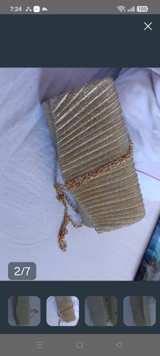 Bolso de fiesta dorado con cadena