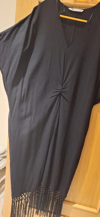 Vestido negro Zara Talla L con nudo