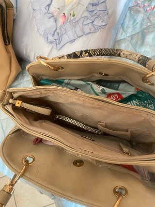 Borsa beige con manico pitone