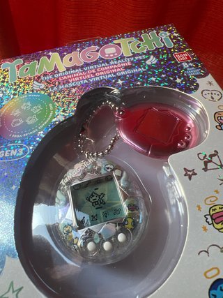 Tamagotchi angel celebration reflection