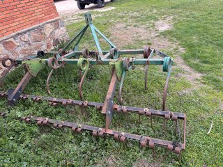 Cultivador Ranson 11 brazos con rastra