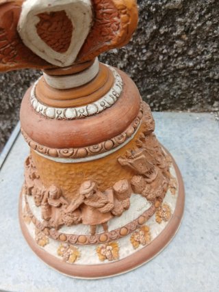 Campana in cotto decorata