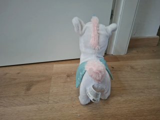Peluche unicorno sonoro che cammina