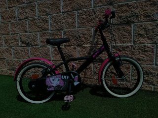 Bicicleta infantil rosa y negra