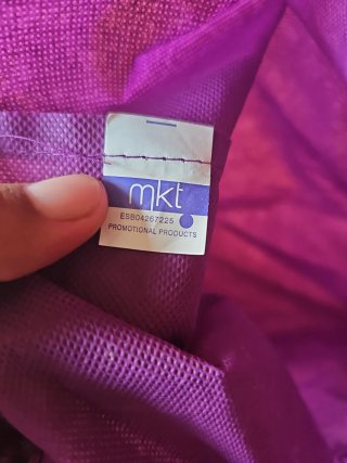 Mochila morada Cursa de la Dona