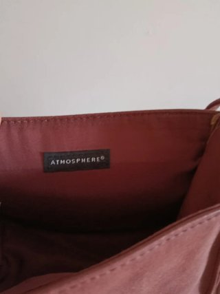 Bolso rosa con detalles calados