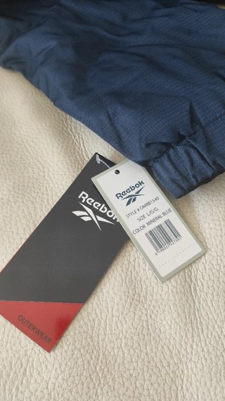 Cortavientos Reebok Azul