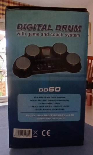 Bateria digital con su caja y accesorios