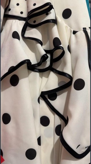 Traje de flamenca blanco con lunares