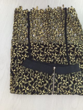 Falda tubo negra y dorada