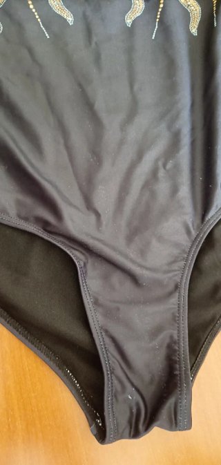 Costume da bagno nero e oro