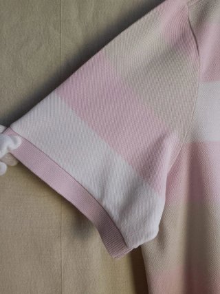 Polo Lacoste a righe rosa e bianche