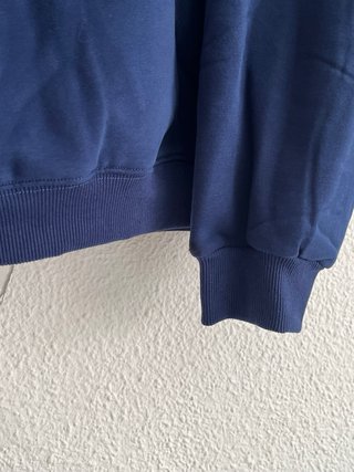 Sudadera azul con cremallera y logo Unisex