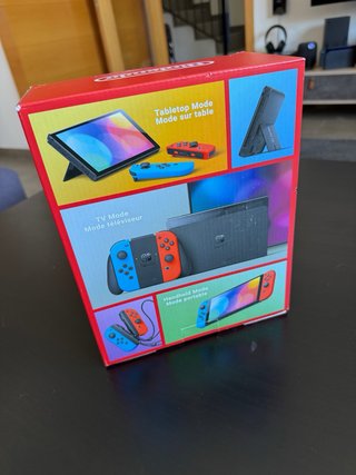 Nintendo Switch OLED Azul Rojo Caja