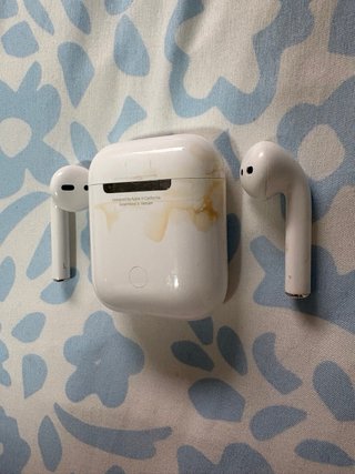 AirPods Apple con funda Rosa y leopardo