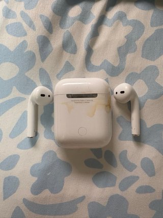 AirPods Apple con funda Rosa y leopardo