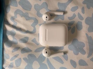 AirPods Apple con funda Rosa y leopardo