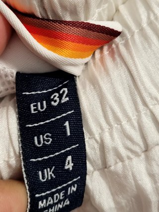 Pantalones deportivos Ellesse blancos y multicolor