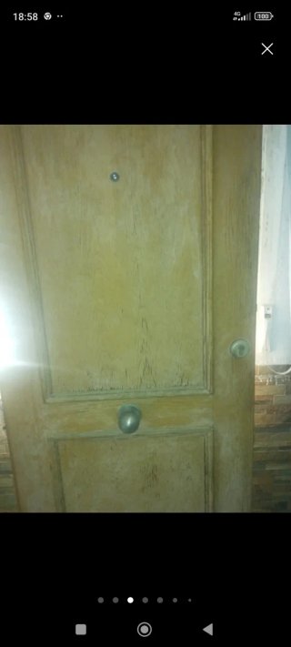 Puerta de entrada chalet madera