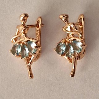 Orecchini in oro 14 k e topazi azzurri