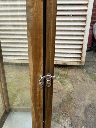 Farol de madera y cristal