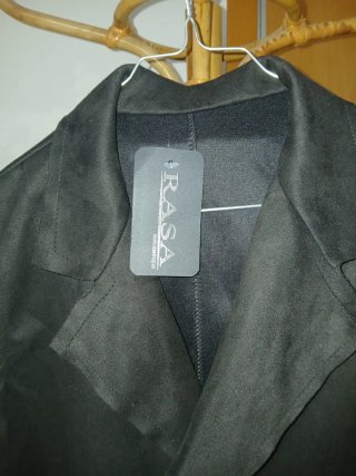 Chaleco negro con flecos nuevo sin usar