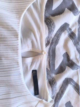 Camisa gasa blanca plisada sin mangas