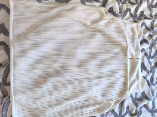 Camisa gasa blanca plisada sin mangas