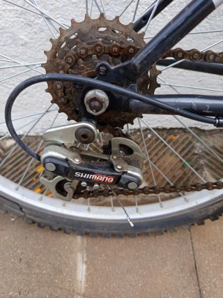 Bicicleta TOPBIKE plateada y negra