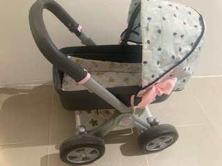 Cochecito de bebé con capota floral