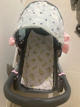 Cochecito de bebé con capota floral