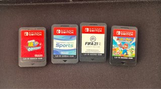 Nintendo Switch + 4 Juegos + fundas