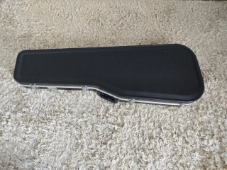 Mala de guitarra rígida