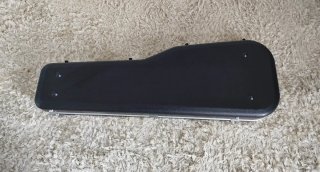 Mala de guitarra rígida