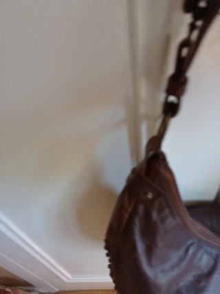 Bolso de piel marrón El Corte Inglés
