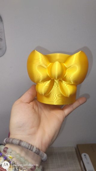 Lapicero/Porta-lápices dorado con diseño de lazo
