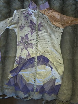 Malla patinaje artístico flores moradas