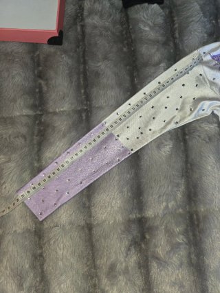 Malla patinaje artístico flores moradas