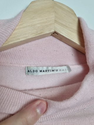 Jersey cuello alto rosa pastel para mujer