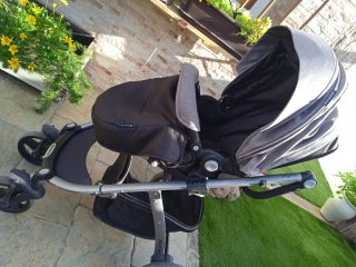 Carro de bebé gris