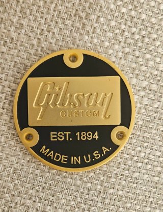 Gibson Custom Shop Placa Metálica Dorado/Negro.