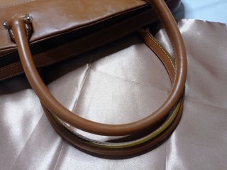 Borsa Balenciaga in pelle marrone e dorata