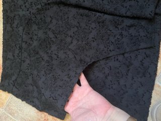 Falda negra corta asimétrica