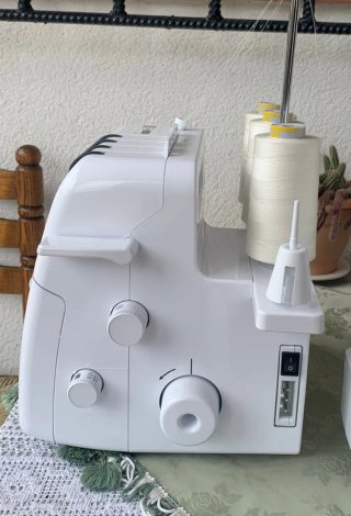 Máquina de coser Brother 2104D negociable