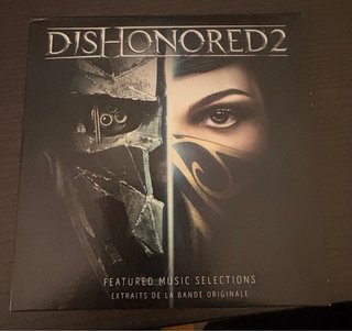 Máscara Dishonored, anillo, libro de arte y cd