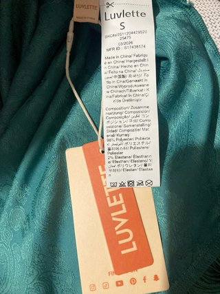 Vestido elegante turquesa con flecos
