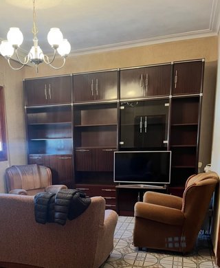 Mueble de salón vintage con cama mueble