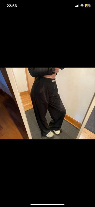 Pantalón de pinzas negro