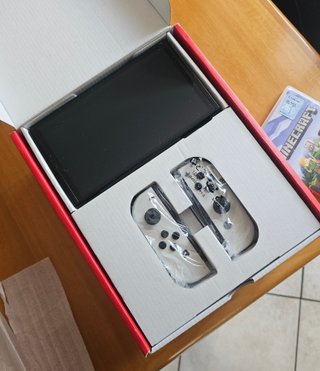 Nintendo Switch OLED - Come nuova + Minecraft