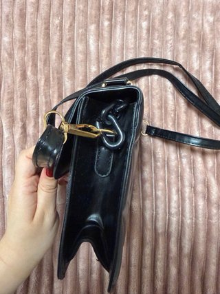Bolso negro acolchado